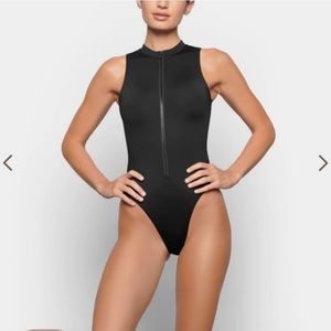 NWT Skims one piece zip front swimsuit